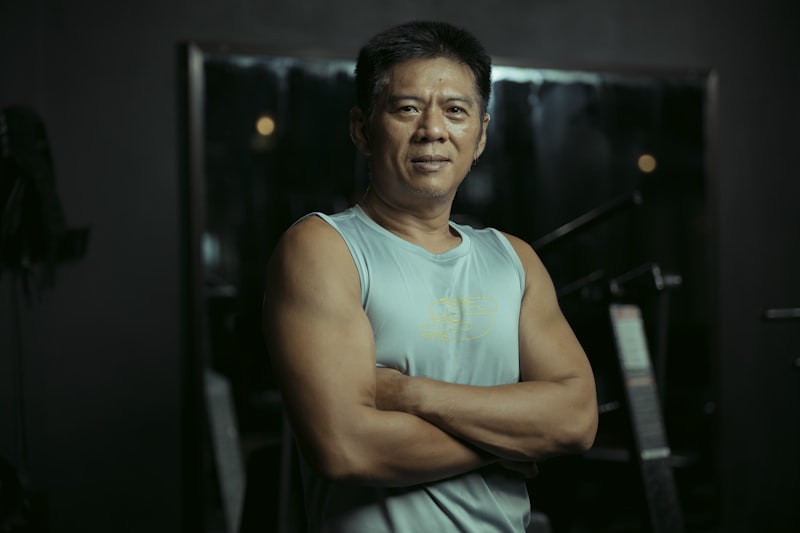 Fit mature man in gym — longevity and wellness